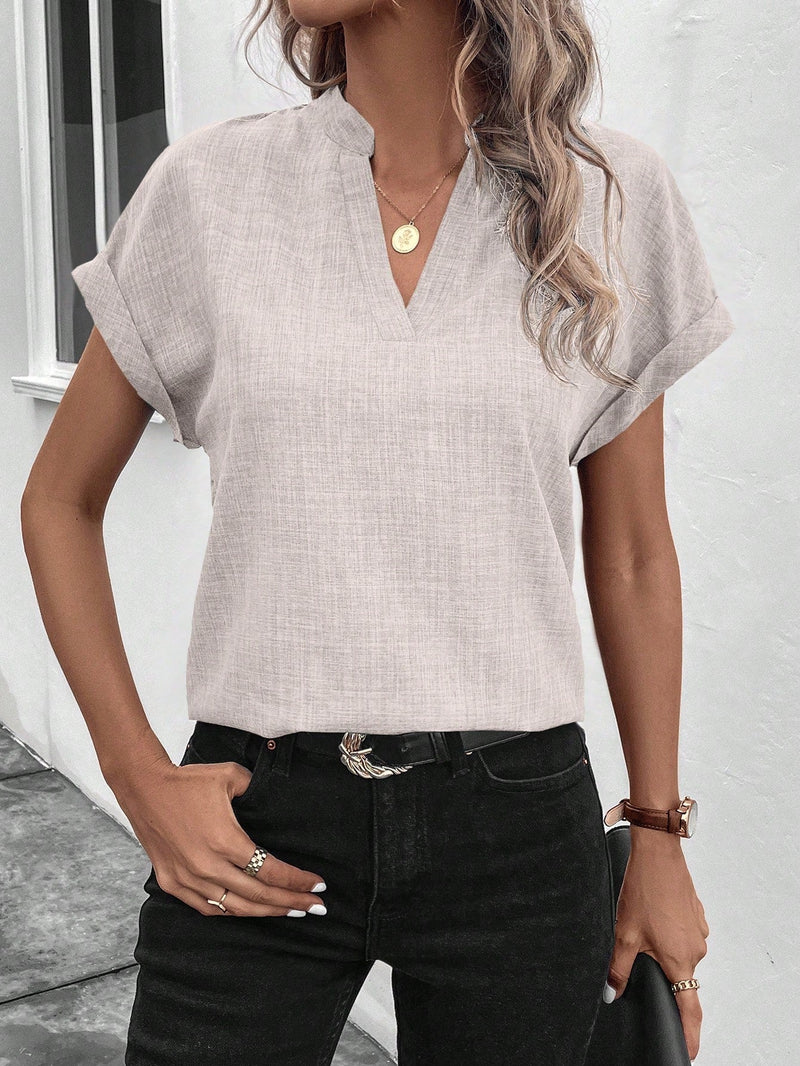 Blusa de linho com decote em V