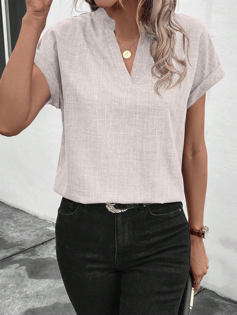 Blusa de linho com decote em V